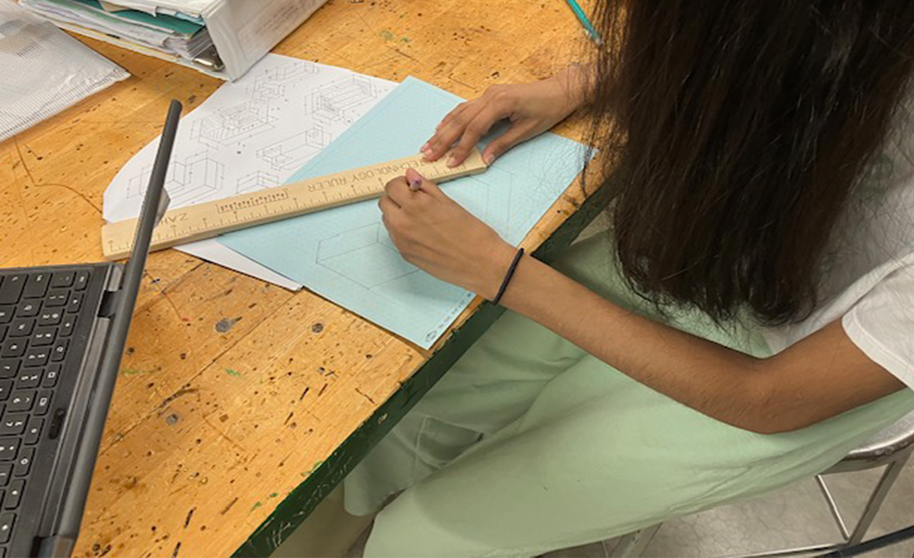 each-8th-grade-technology-student-sanded-wood-blanks-and-laser-engraved