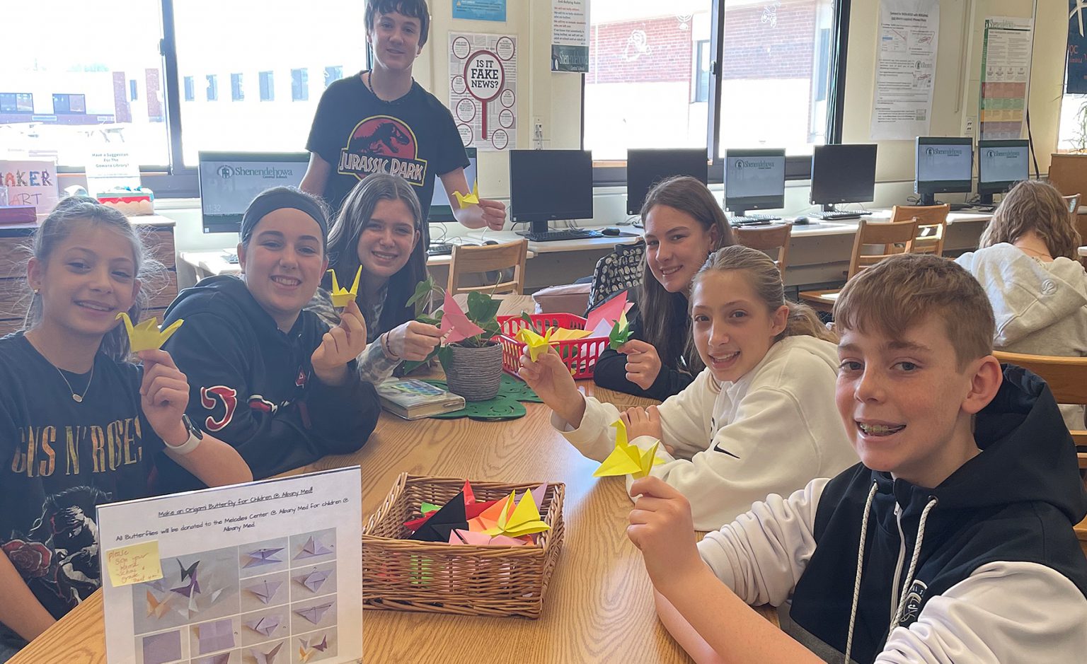 gowana-middle-school-students-making-origami-paper-cranes-and